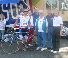 Bike rider Chris Konig, U.S. Army, who is recovering from shrapnel wounds suffered in Iraq last year, visits with (left to right) Susie Johansen, American Legion Post 283 Auxiliary President; John Johansen, Post 283 Commander; Ruth Hackney, Auxiliary Treasurer/Secretary; Carl Stromberg, Sons of the American Legion Squadron Commander; and Vi Walquist, Auxiliary officer.